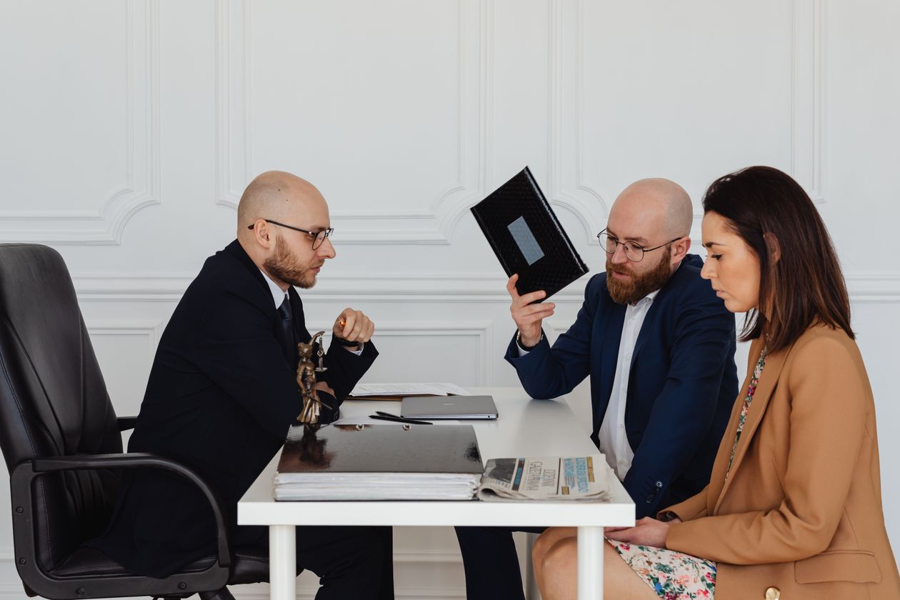 Married couple meeting with a South Carolina family law attorney to discuss how alimony works